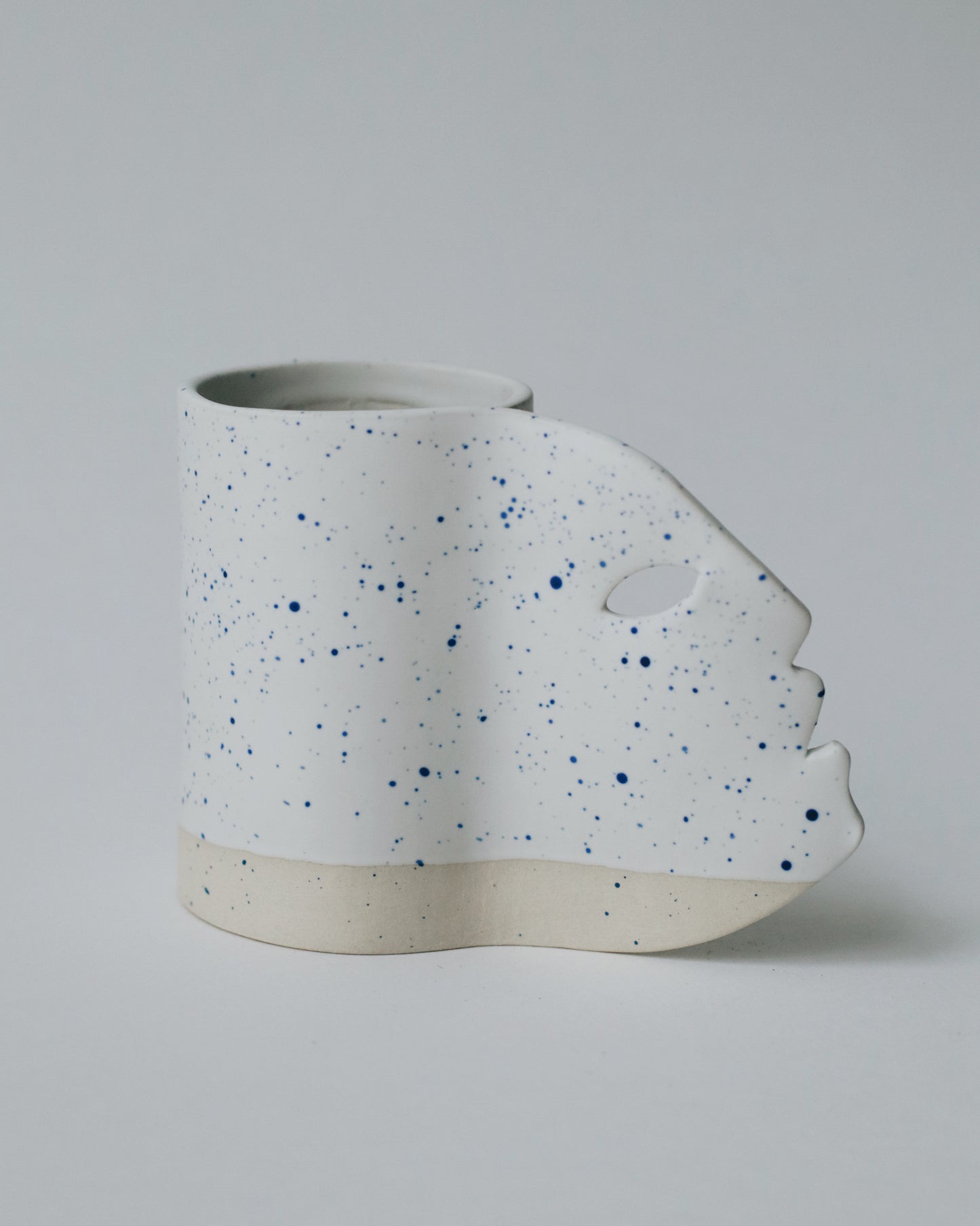 blanc moucheté bleu